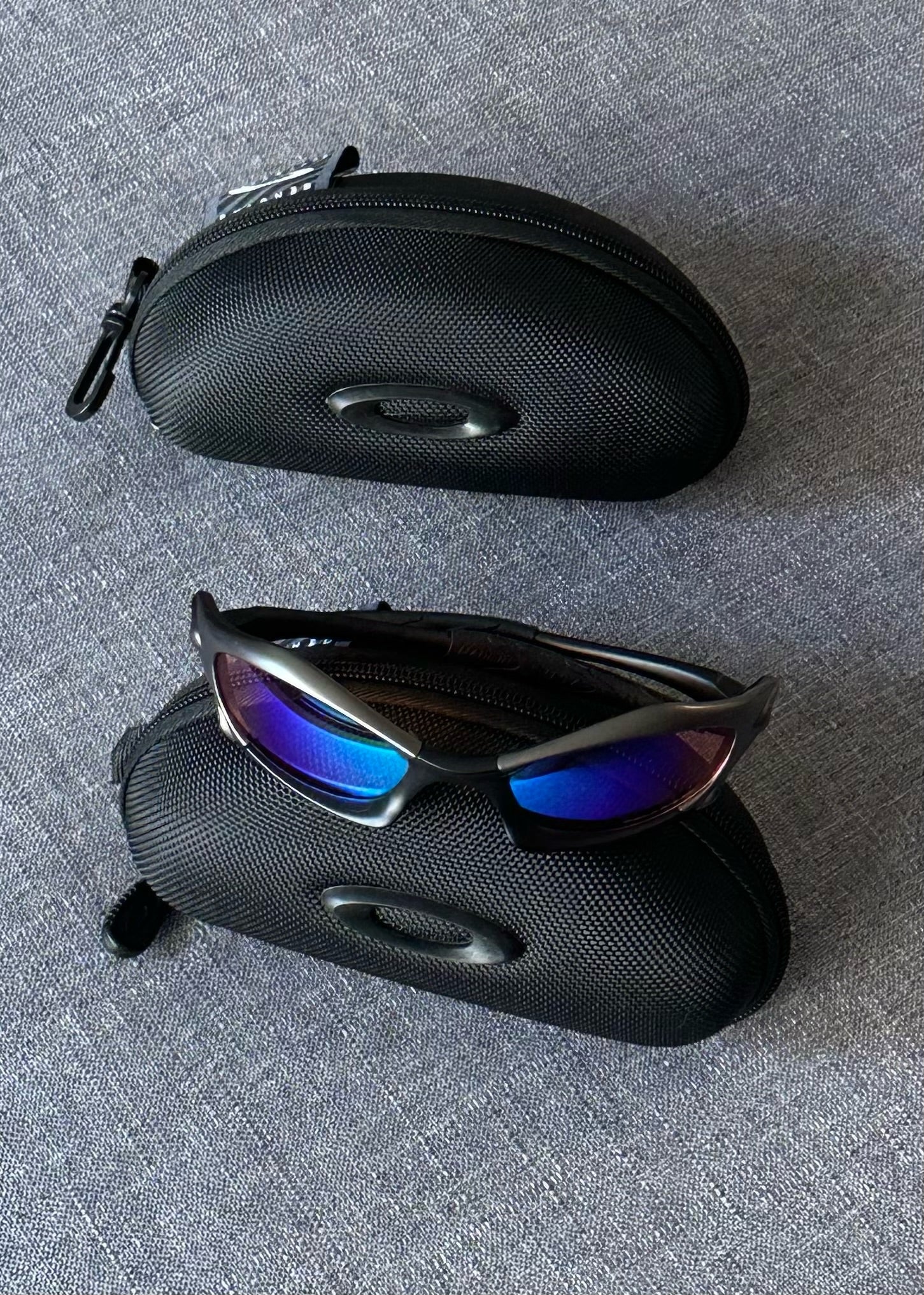 Vintage Oakley Sunglasses: Charcoal Frame, Blue–Purple Iridium Mirrored Lenses with Case