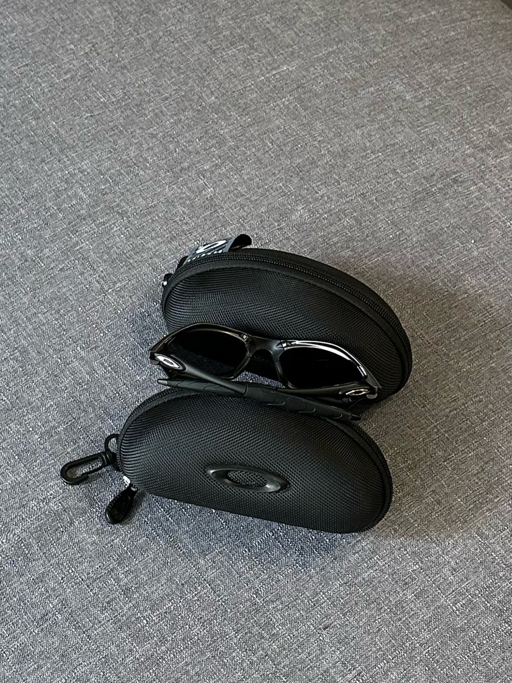 Vintage Oakley Sunglasses: Charcoal Frame, Smoky Silver Lenses with Case