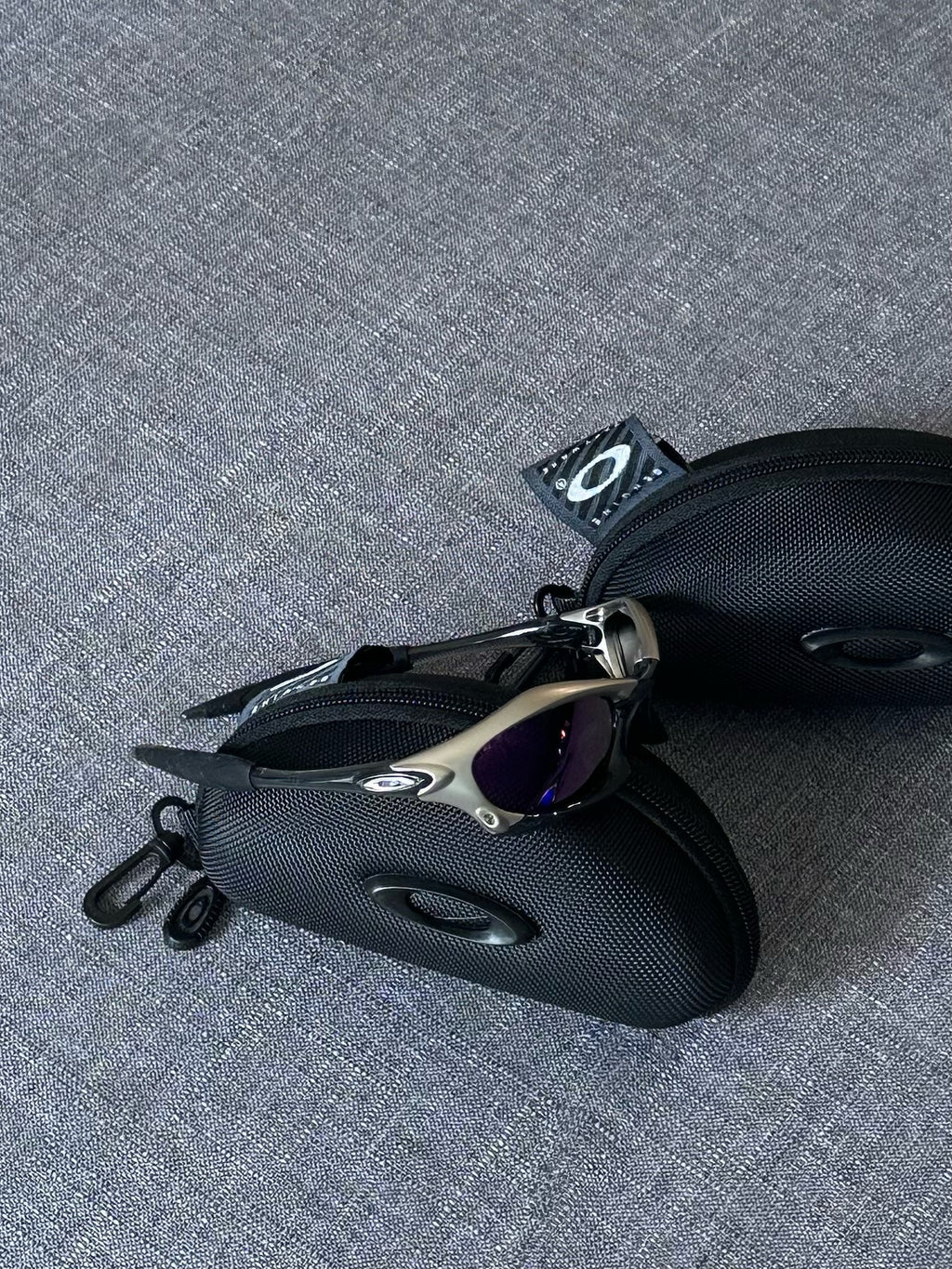 Vintage Oakley Sunglasses: Silver Frame, Purple Lenses with Case