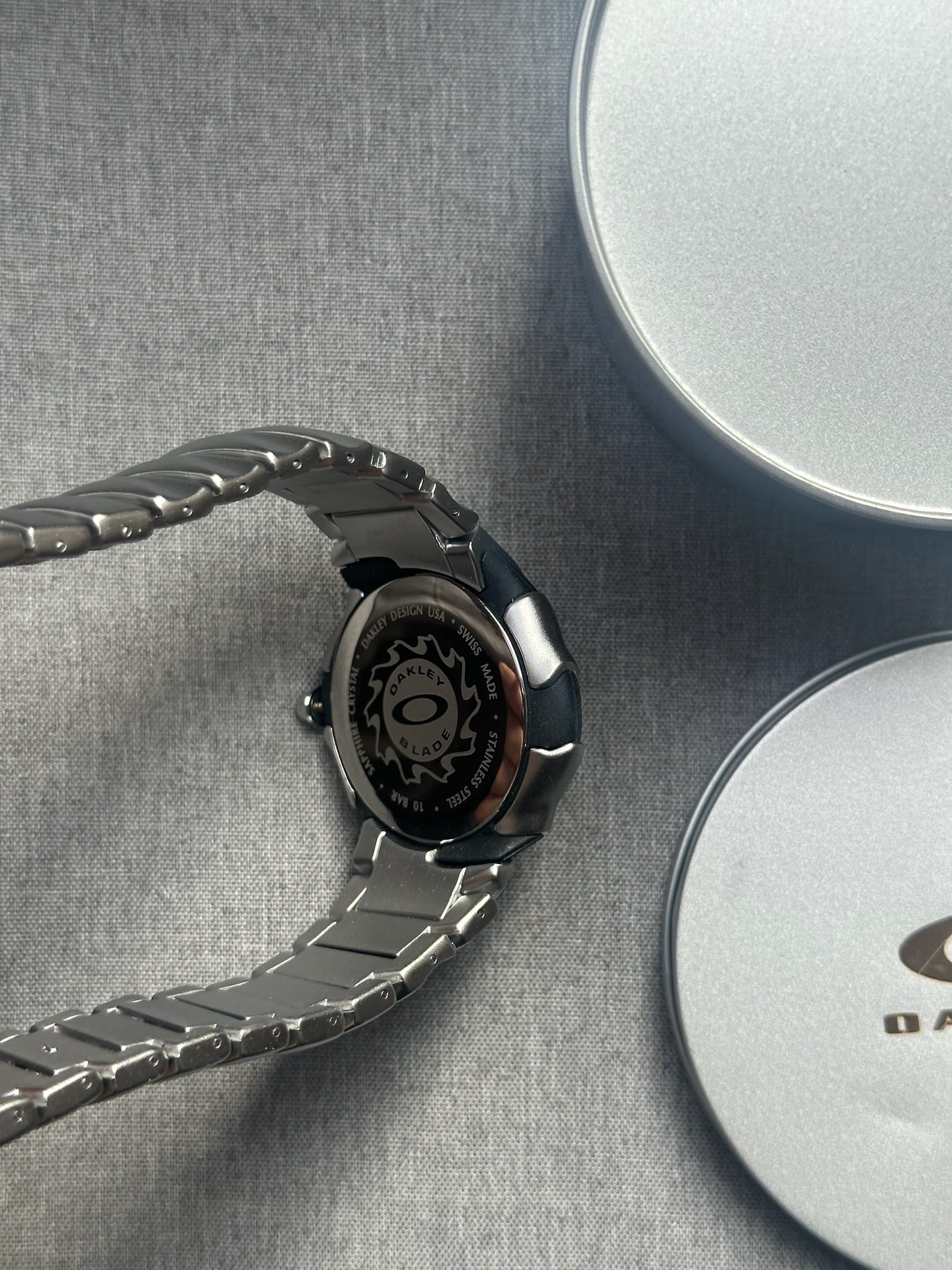 Oakley Blade Watch: Silver Brushed Stainless Steel with Yellow Dial, Swiss Movement