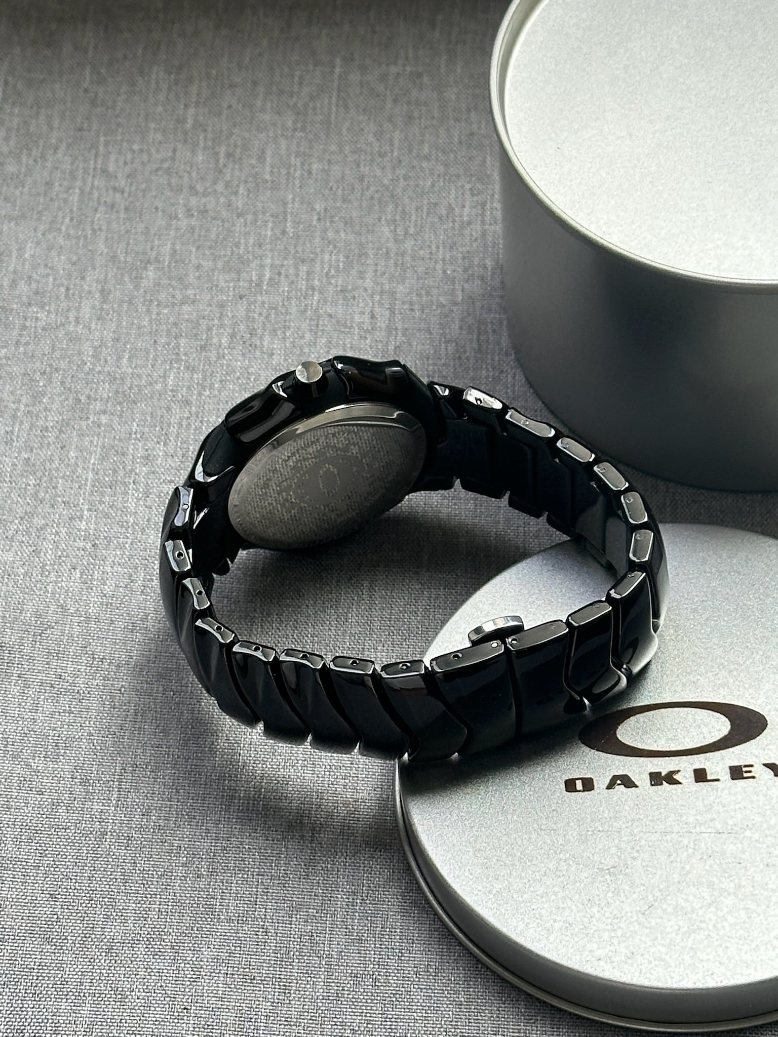 Oakley Time Tank Watch – Black dial Black SHINY Stainless Steel, Swiss Movement, Collectible Men’s Watch