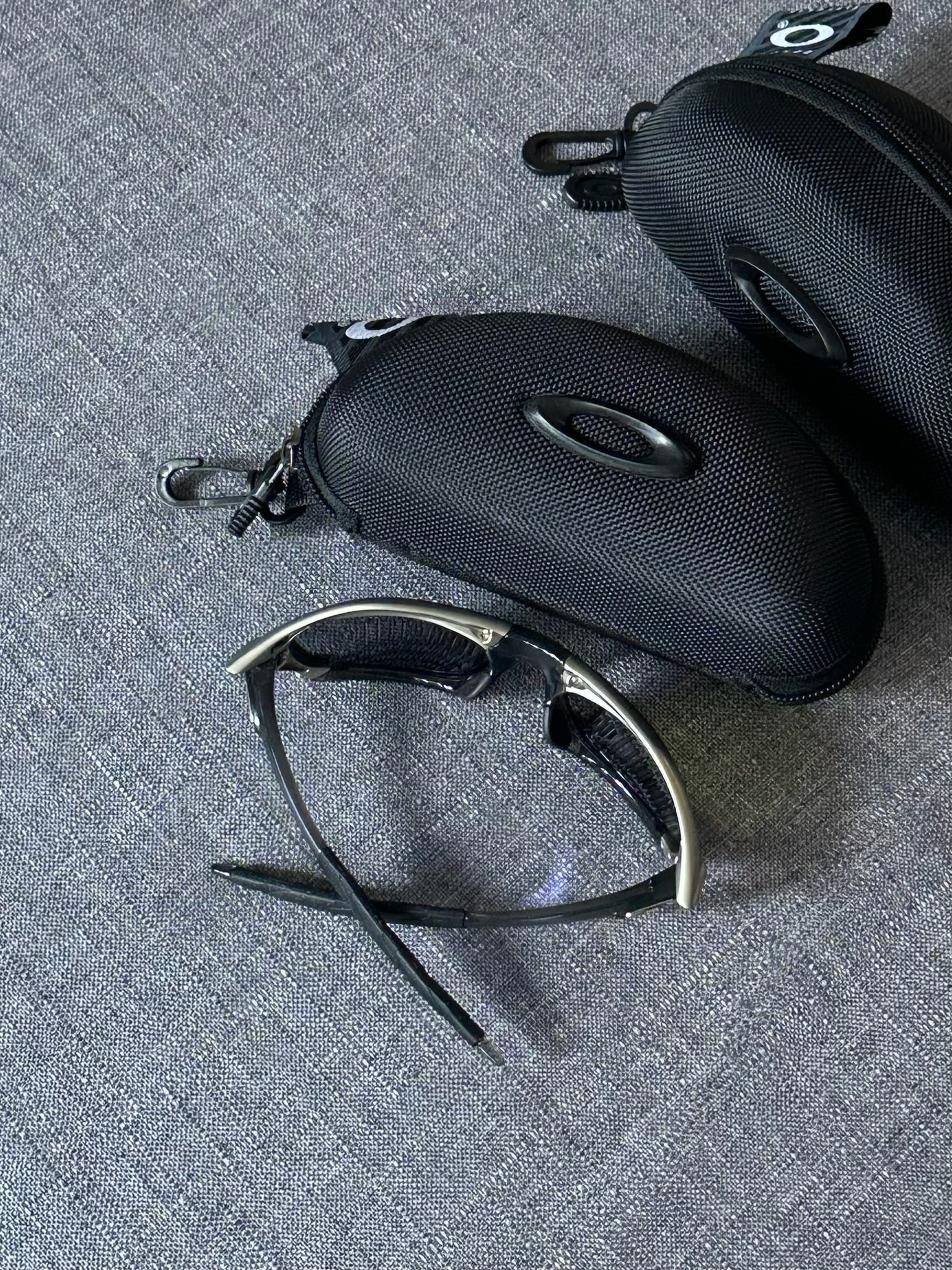 Vintage Oakley Sunglasses: Polished Silver Frame, Blue Lenses - Vintage Collectible