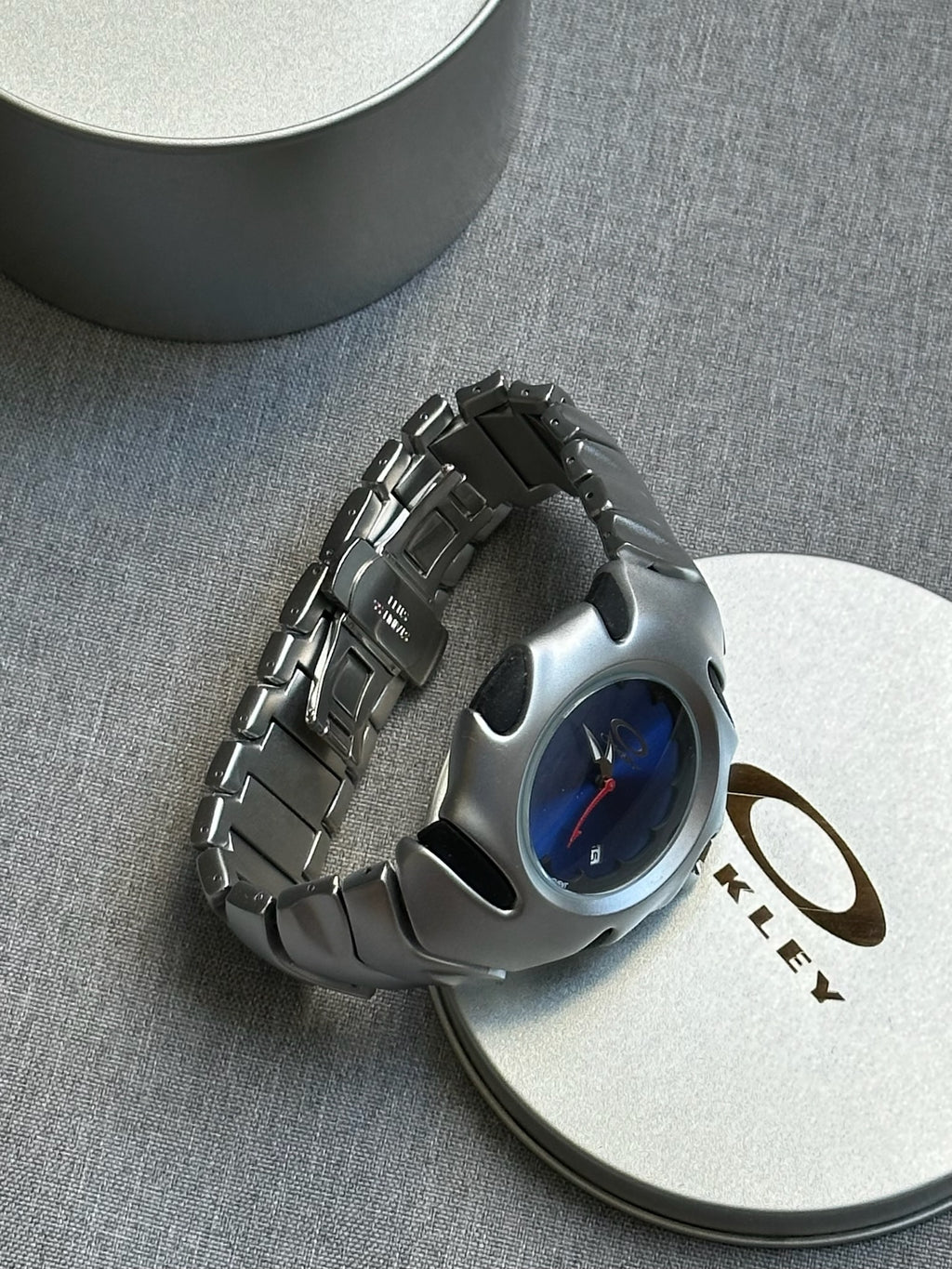 Oakley Blade Watch: Silver Brushed Stainless Steel with Blue Dial, Swiss Movement
