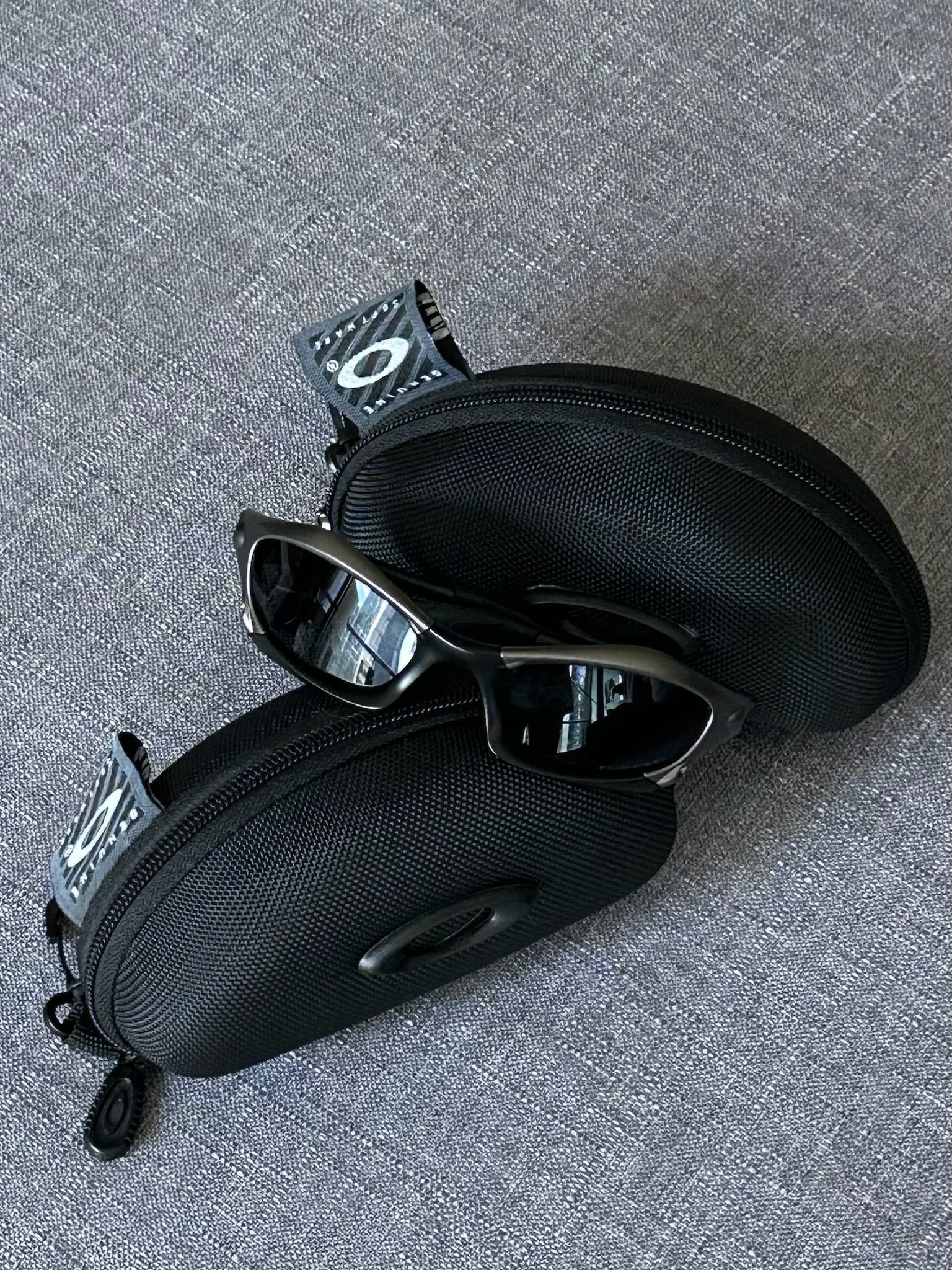 Vintage Oakley Sunglasses: Polished Charcoal Frame, Black Lenses with Case