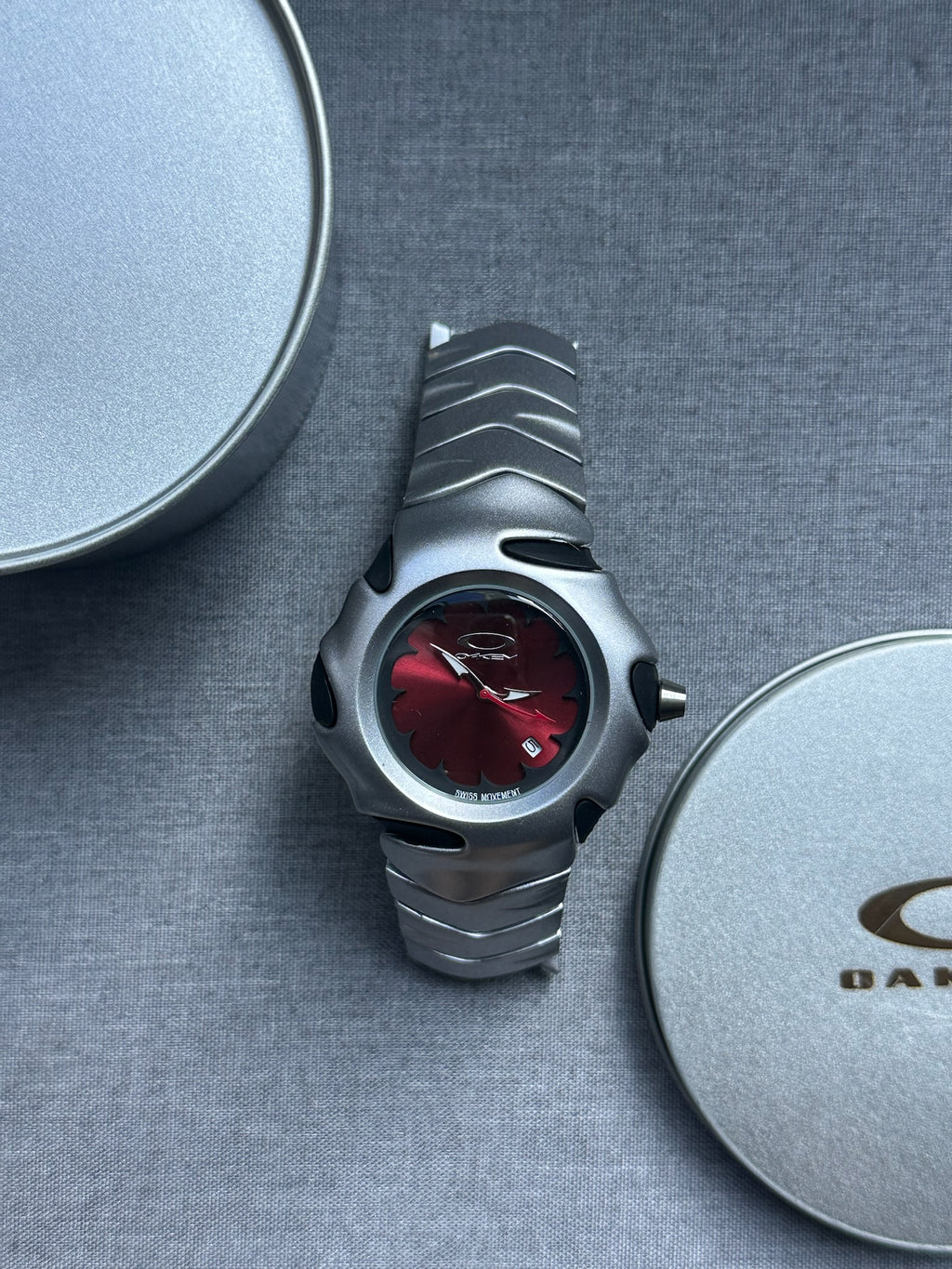 Oakley Blade Watch: Silver Brushed Stainless Steel with Red Dial, Swiss Movement