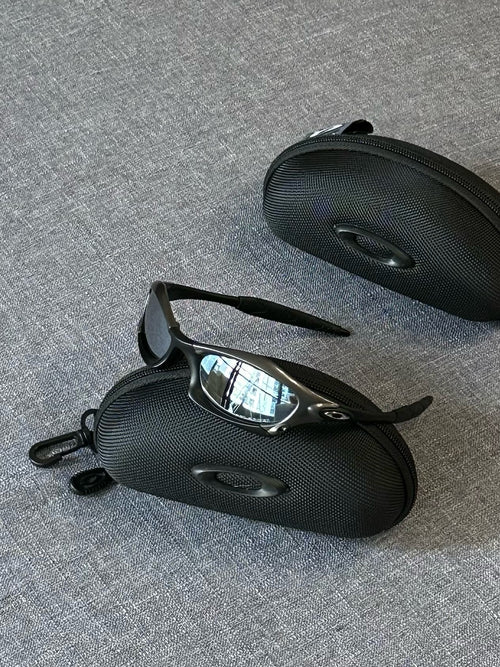 Vintage Oakley Splice Sunglasses: Charcoal Frame, Smoky Silver Lenses with Case