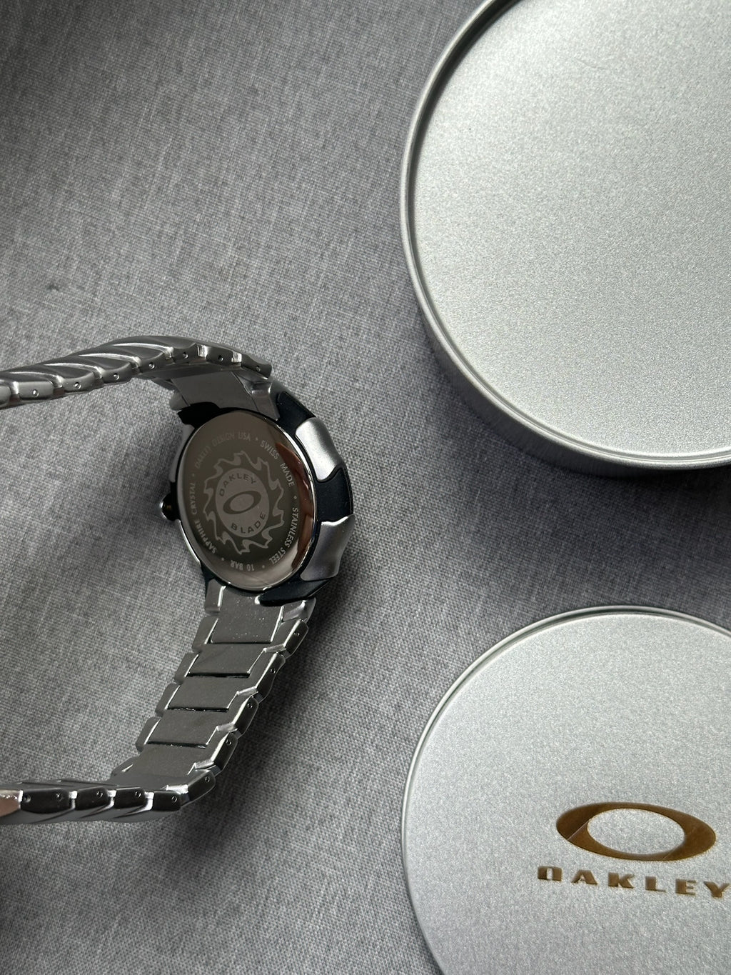 Oakley Blade Watch: Silver Stainless Steel Brushed with White Dial, Swiss Movement
