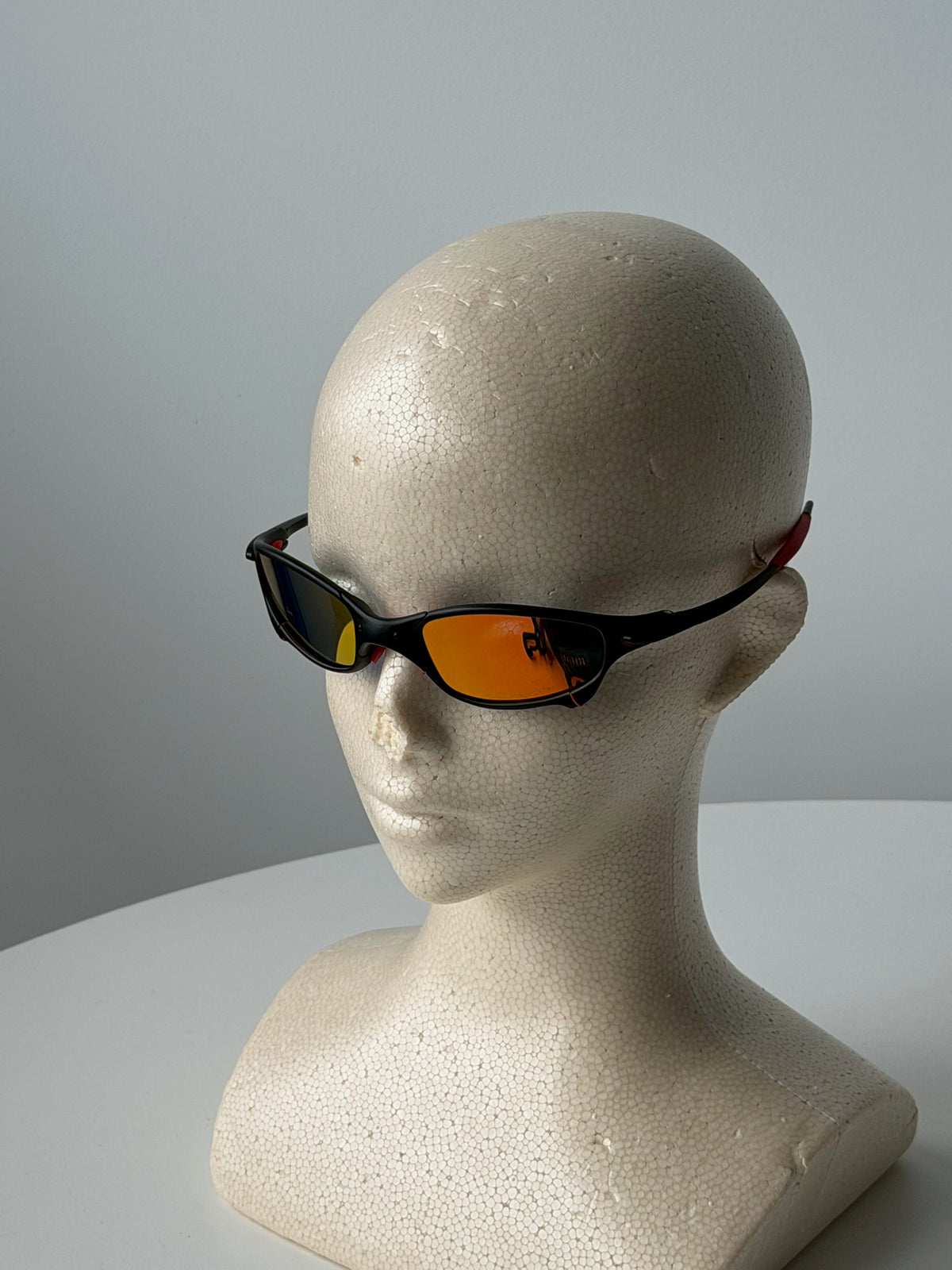 Vintage Oakley Juliet 1.0 – Black & Red Frame / Fire Orange Mirror Lens