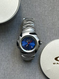 Oakley Blade Watch: Silver Brushed Stainless Steel with Blue Dial, Swiss Movement
