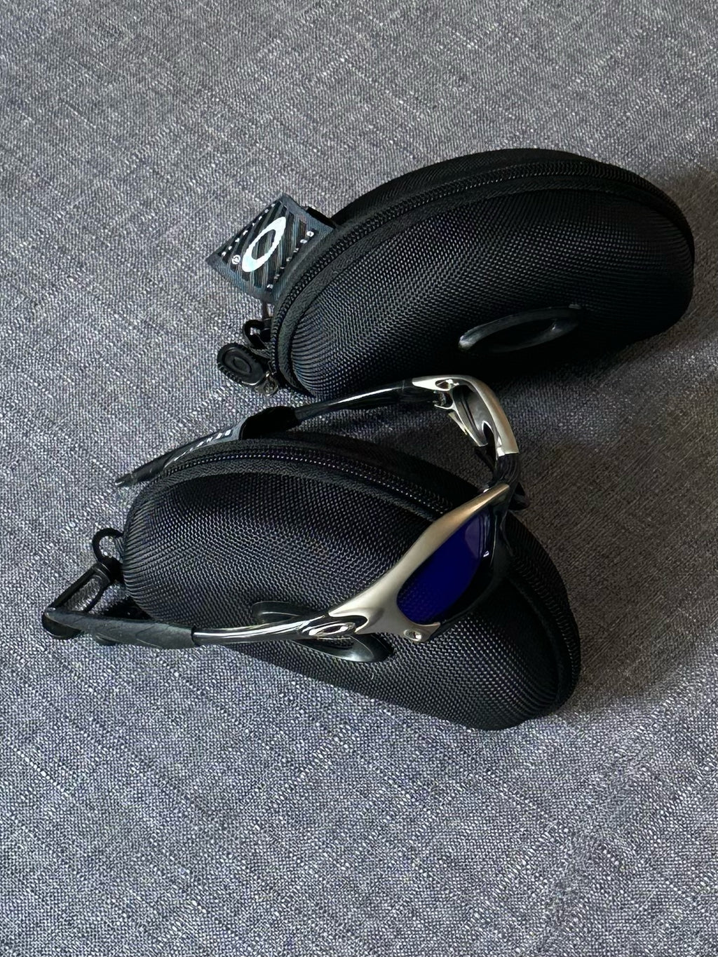 Vintage Oakley Sunglasses: Polished Silver Frame, Blue Lenses - Vintage Collectible