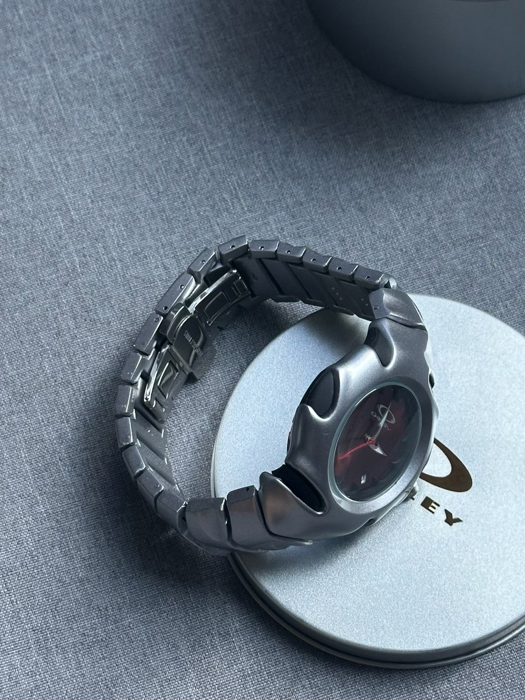 Oakley Blade Watch: Silver Brushed Stainless Steel with Red Dial, Swiss Movement