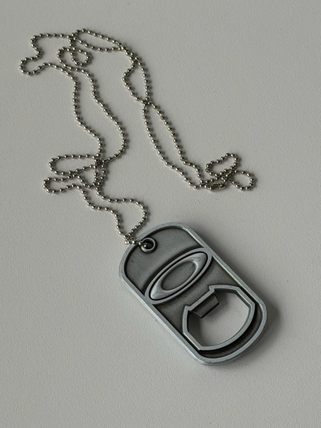 Vintage Oakley 2014 Dog Tag Bottle Opener Necklace – Silver Zinc Alloy Pendant