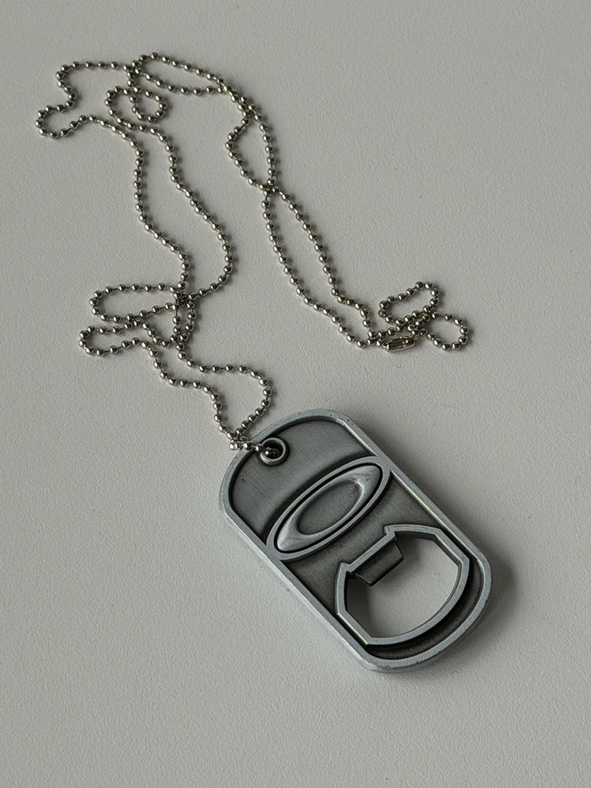 Vintage Oakley 2014 Dog Tag Bottle Opener Necklace – Silver Zinc Alloy Pendant