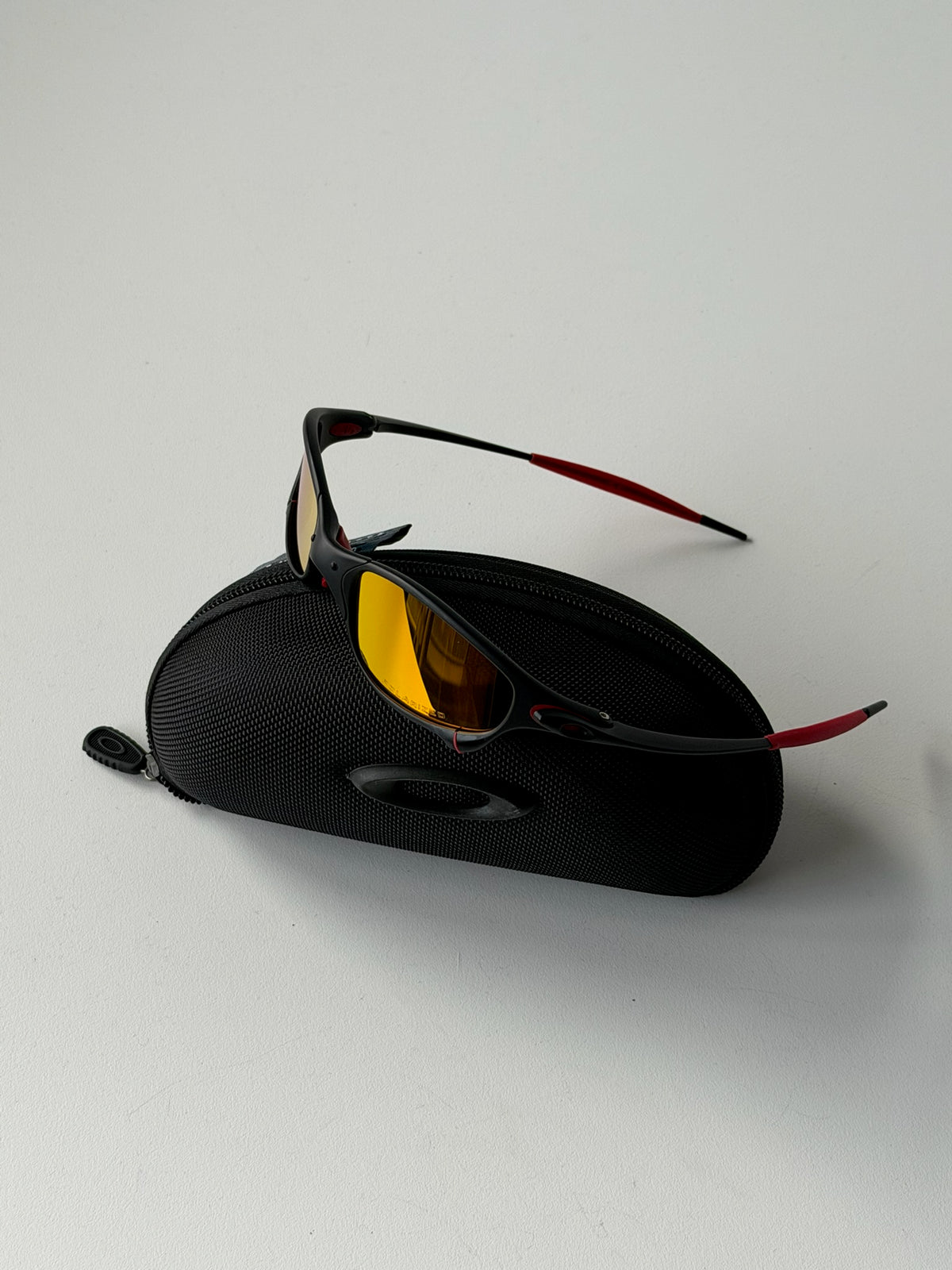 Vintage Oakley Juliet 1.0 – Black & Red Frame / Fire Orange Mirror Lens