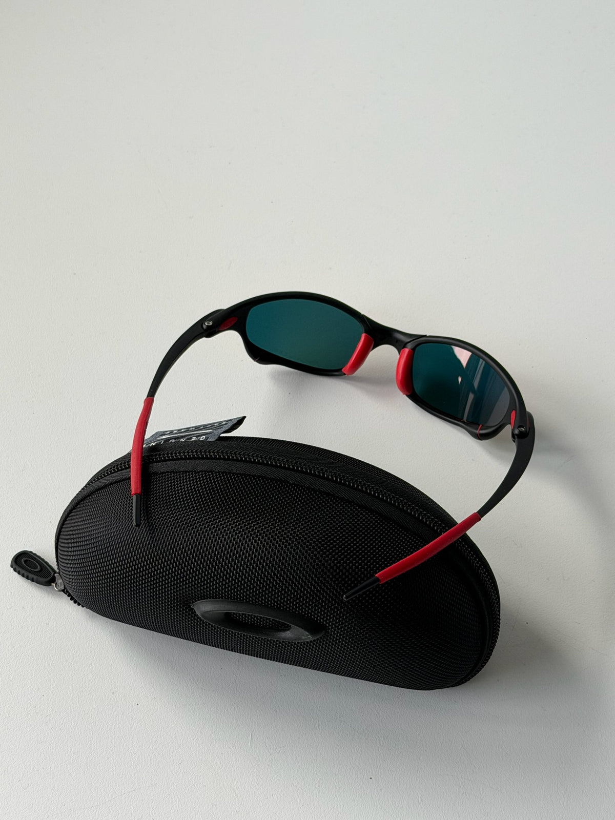 Vintage Oakley Juliet 1.0 – Black & Red Frame / Fire Orange Mirror Lens