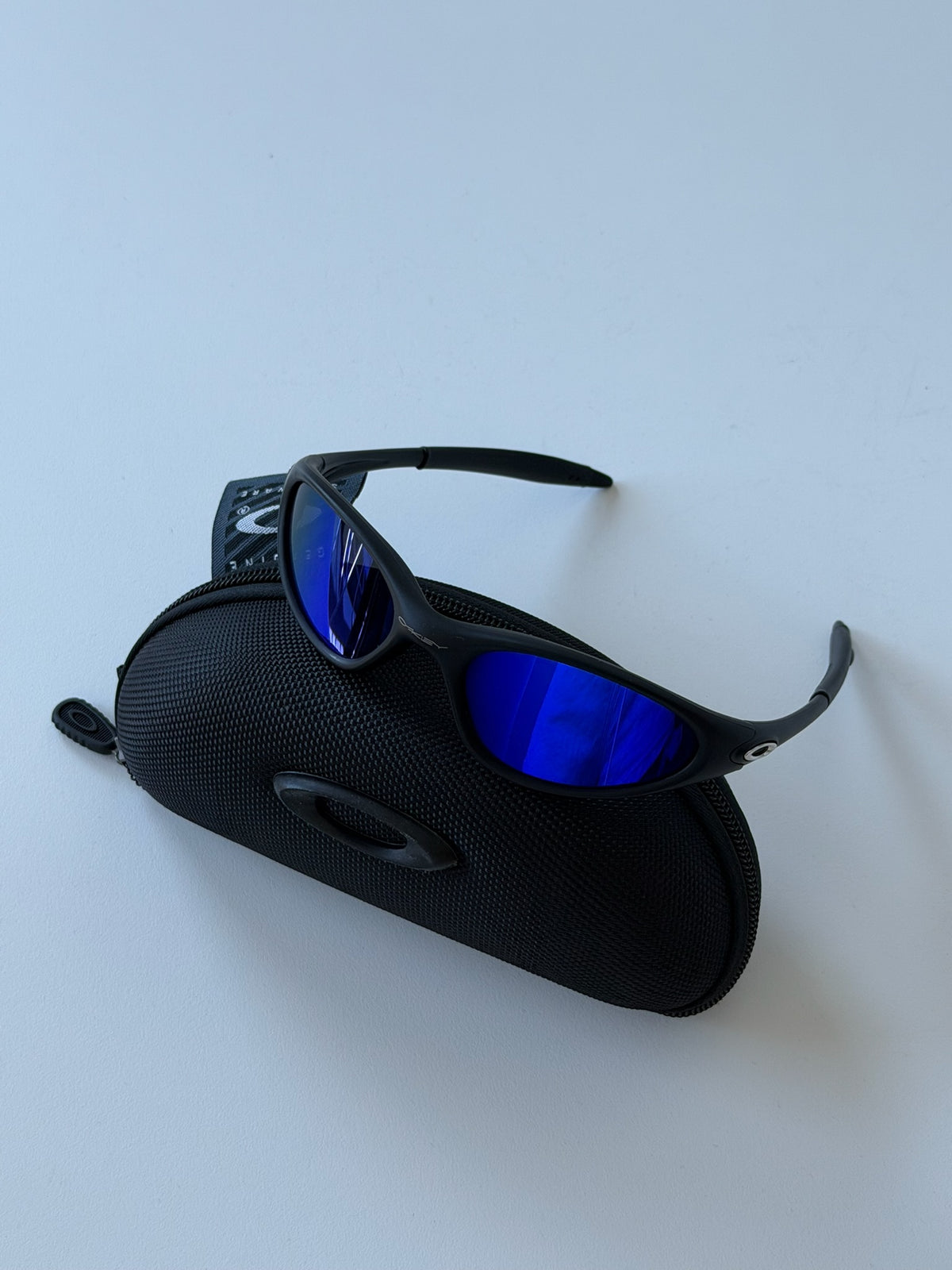 Oakley Eye Jacket Minute 1.0 – Matte Black Frame / Electric Blue Mirrored Lens