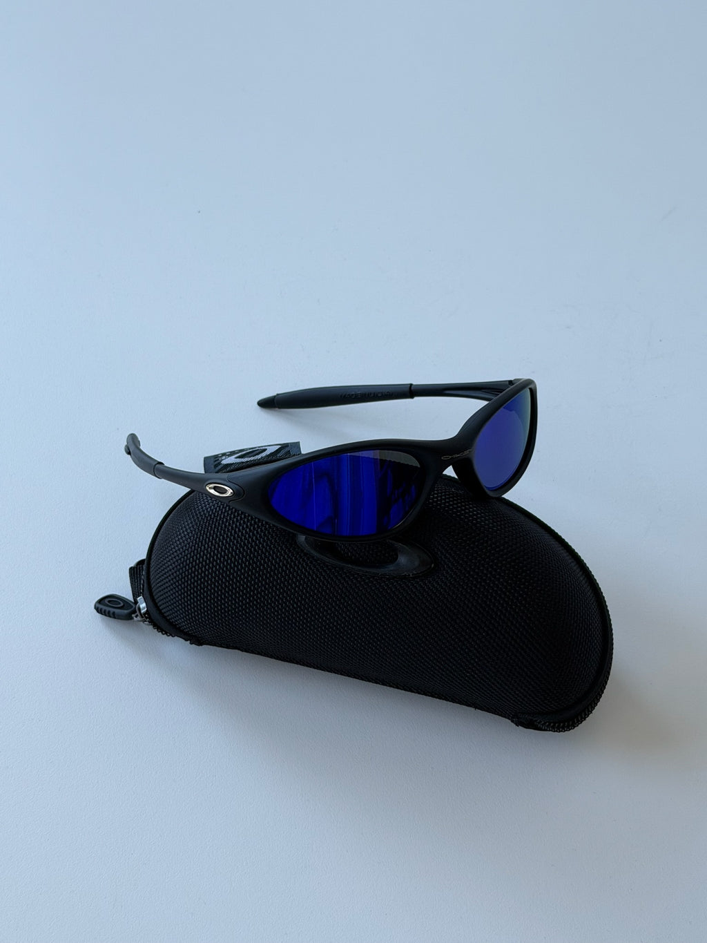Oakley Eye Jacket Minute 1.0 – Matte Black Frame / Electric Blue Mirrored Lens
