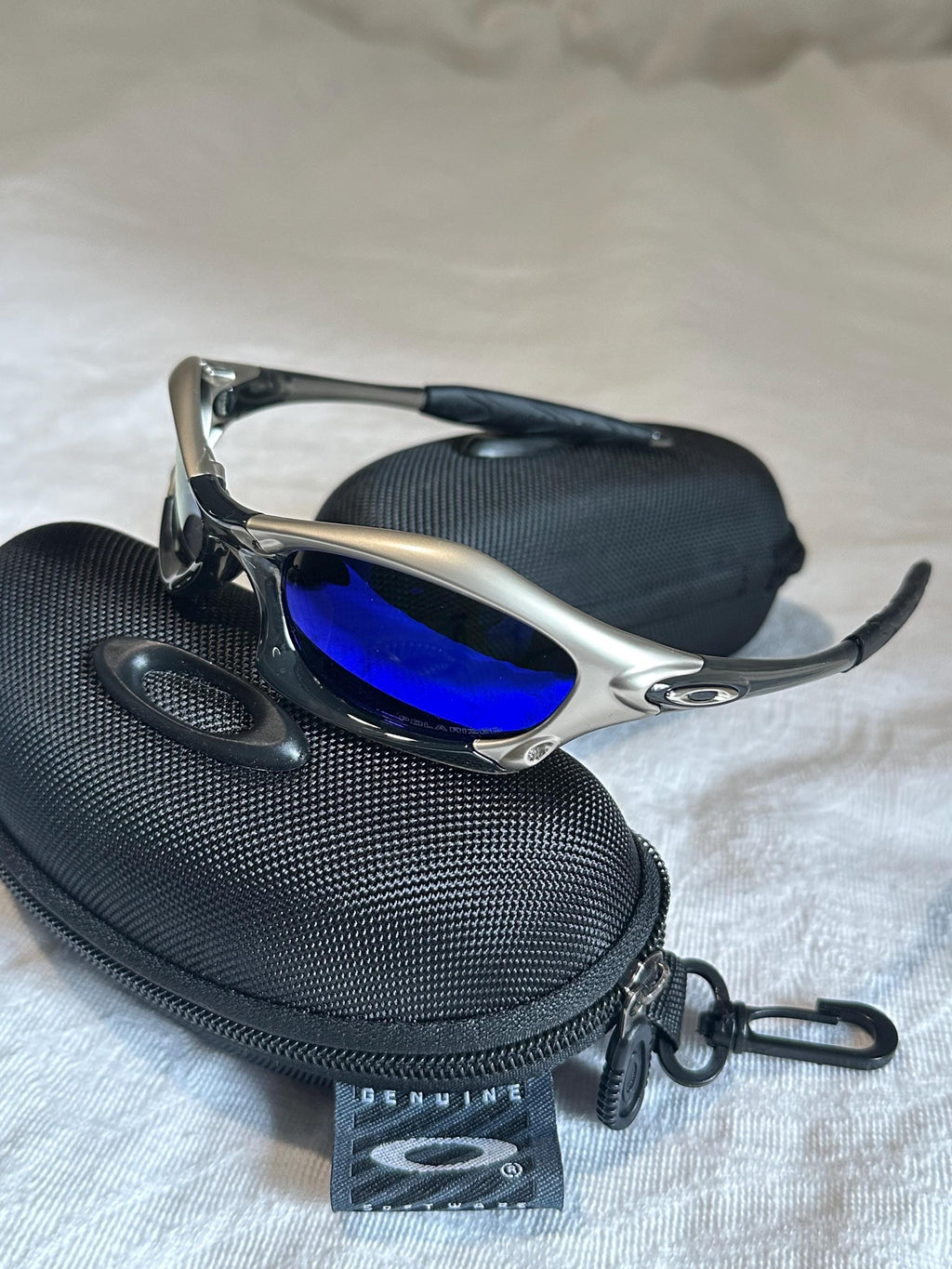 Vintage Oakley Sunglasses: Polished Silver Frame, Blue Lenses - Vintage Collectible