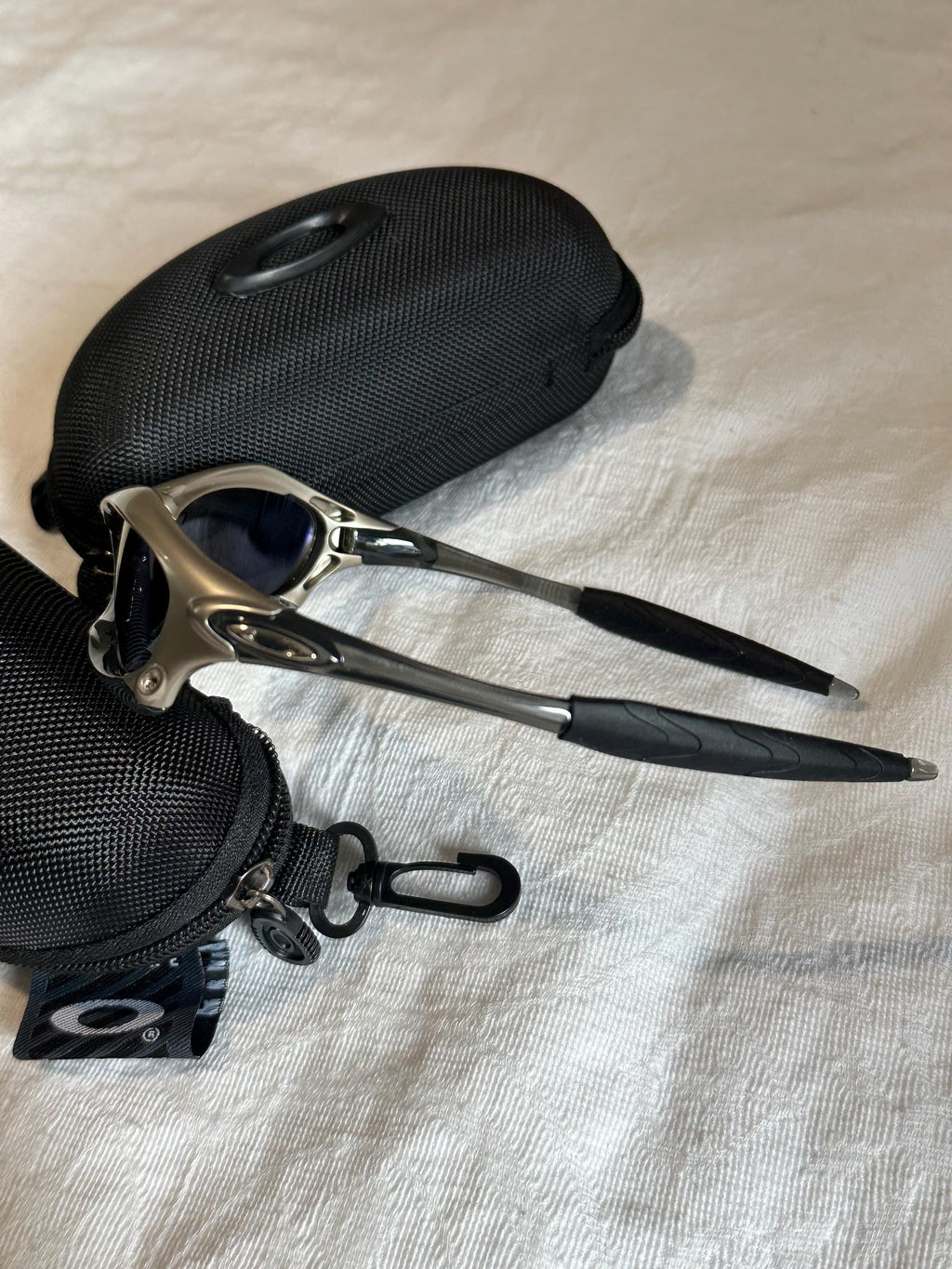 Vintage Oakley Sunglasses: Polished Silver Frame, Blue Lenses - Vintage Collectible