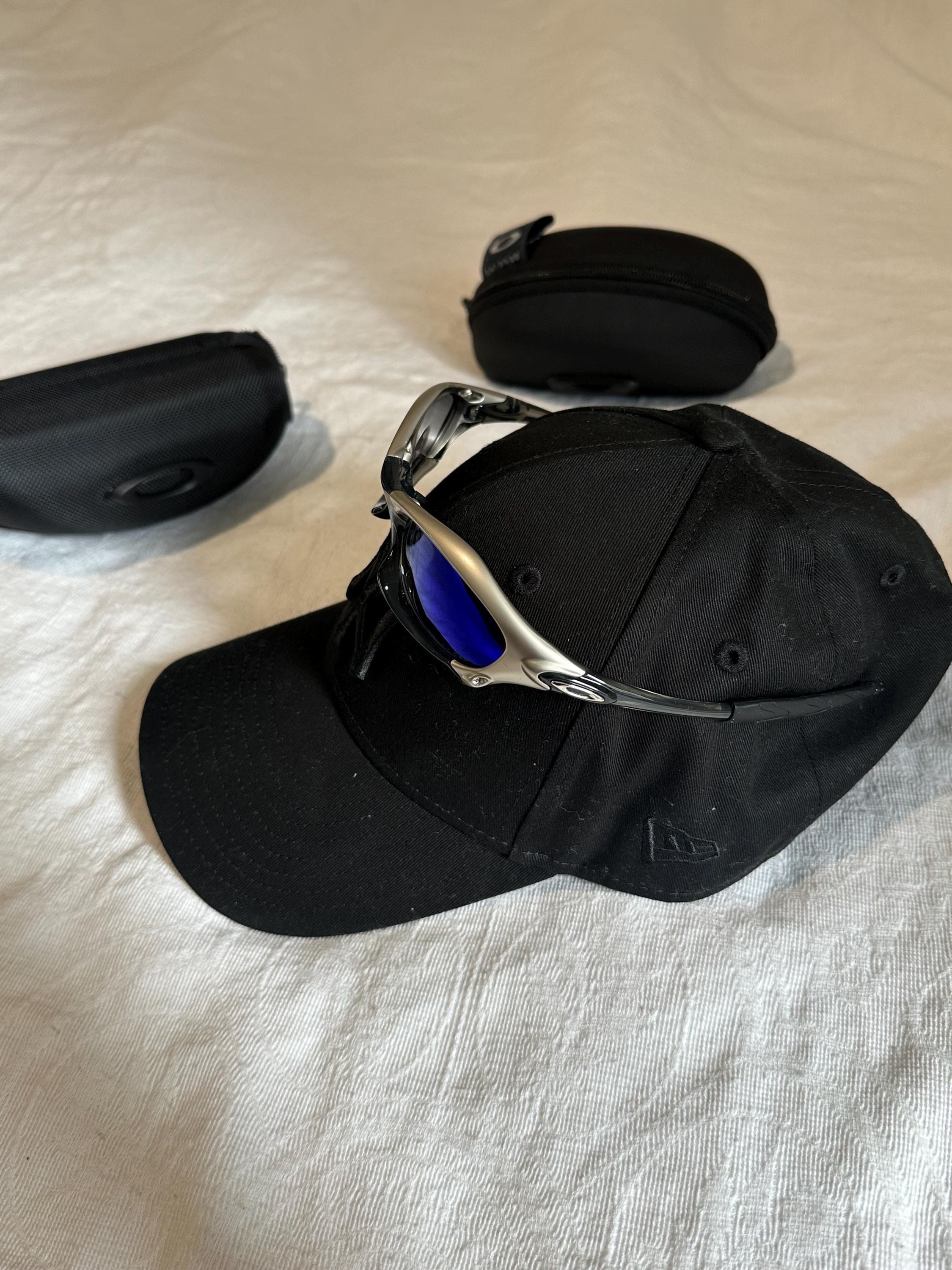 Vintage Oakley Sunglasses: Polished Silver Frame, Blue Lenses - Vintage Collectible