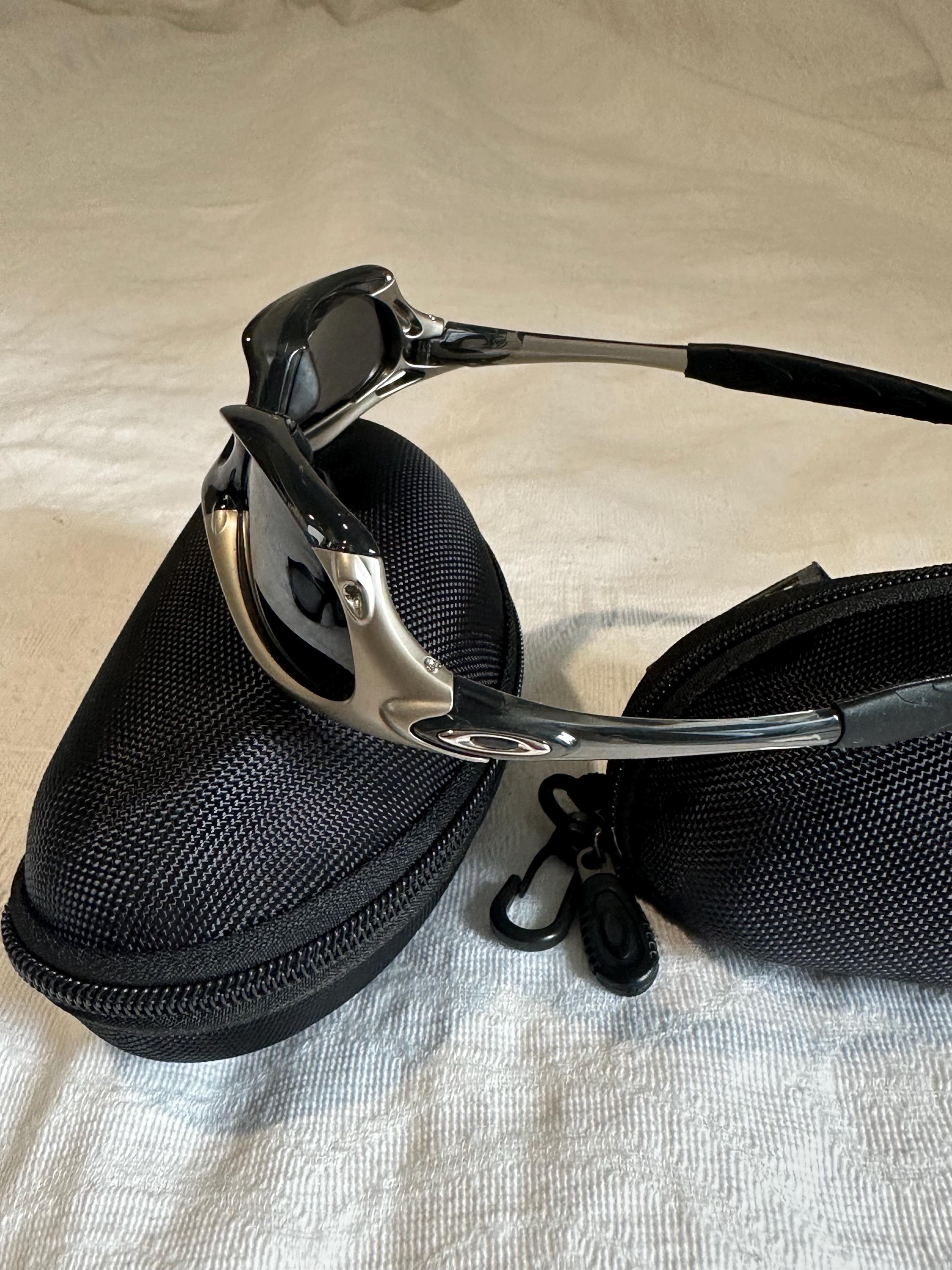 Vintage Oakley Sunglasses: Polished SILVER Frame, Black Lenses - Vintage Collectible