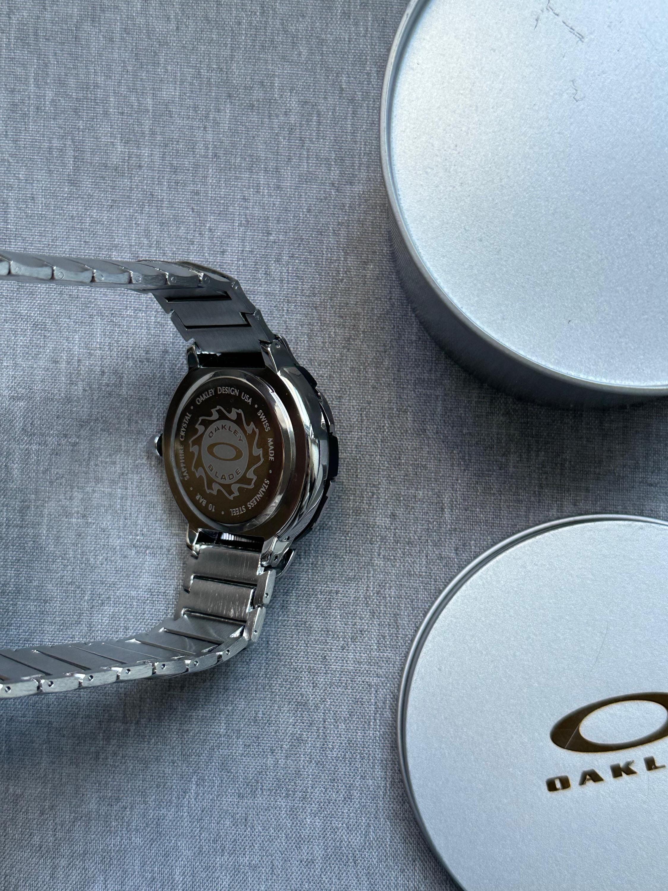 Oakley Time Tank Watch – Blue Dial, SHINY Stainless Steel, Swiss Movement, Rare Collectible