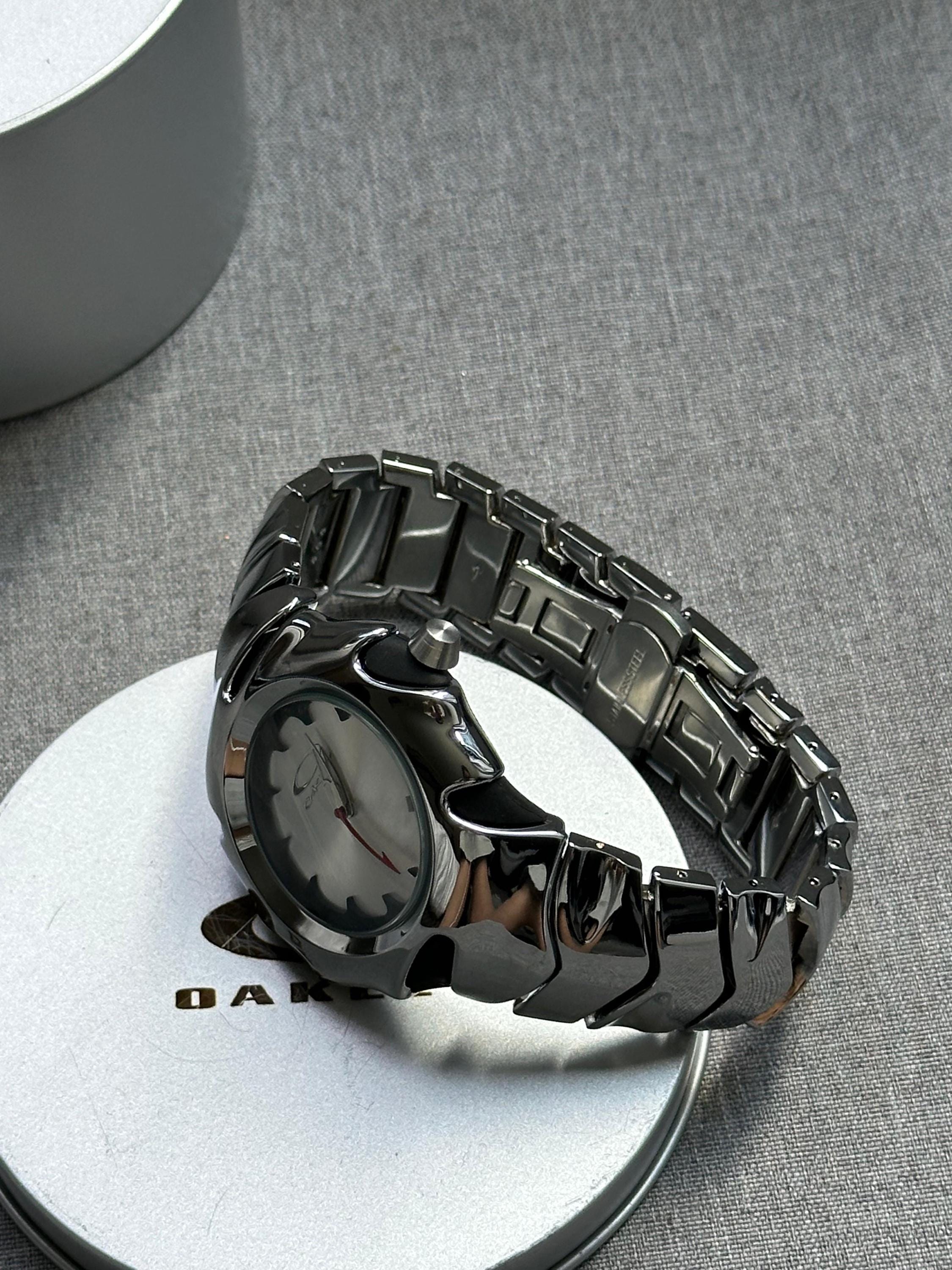 Oakley Time Tank Watch – White Dial Silver SHINY Stainless Steel with Smooth Reflective Strap, Swiss Movement, Collectible Men’s Watch