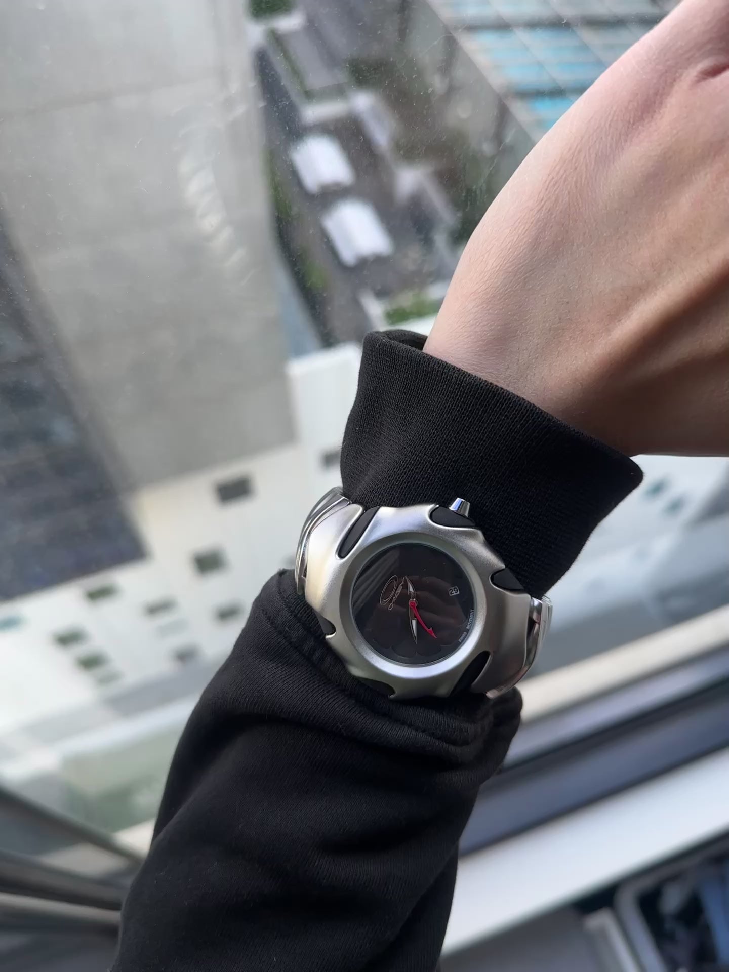 Oakley Time Tank Watch: Silver Stainless Steel with Black Dial, Swiss Movement